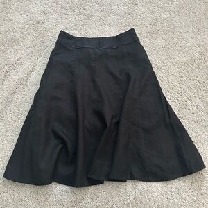 H&M Women’s flowing flare black skirt in size 4. Lined